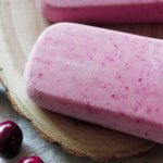 Eggnog cranberry popsicles recipe www.berrymaple.com #popsicle#cranberry#eggnog#holidays#winterpopsicles