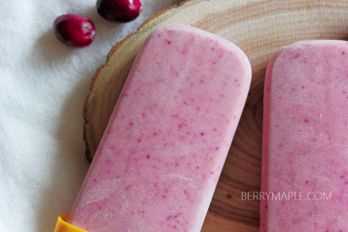 Eggnog cranberry popsicles recipe www.berrymaple.com #popsicle#cranberry#eggnog#holidays#winterpopsicles