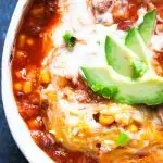 delicious instant pot chili with avocado and sour cream on top