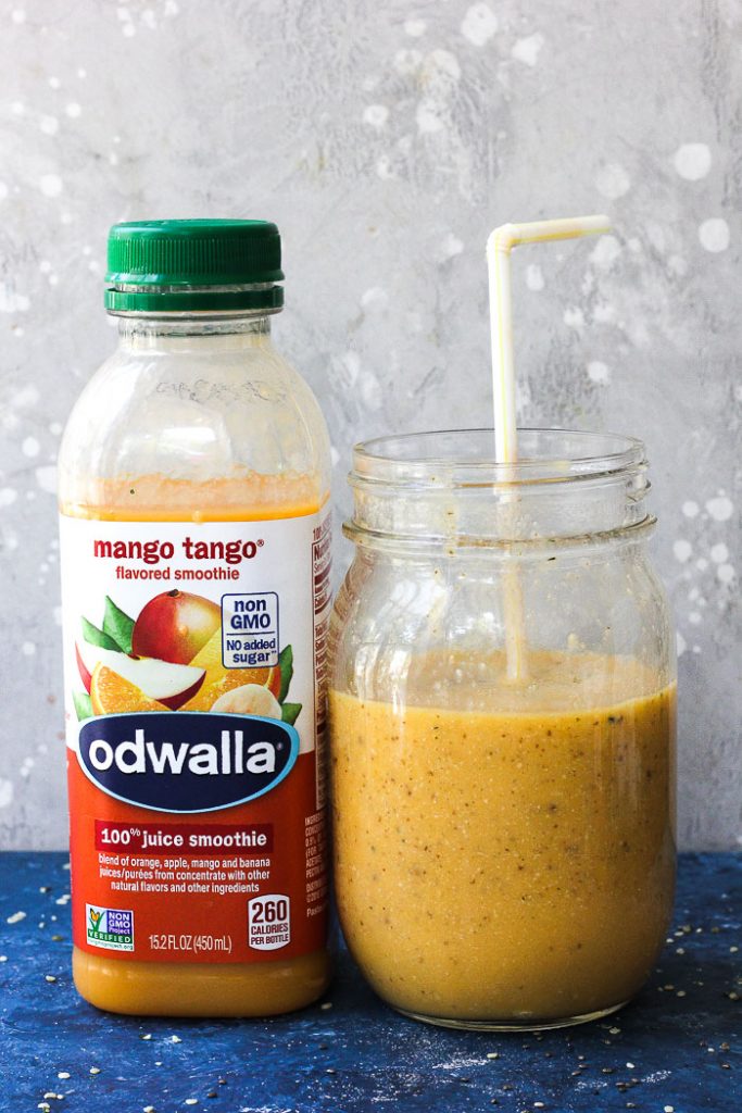 mason jar with mango oramge smoothie and odwalla