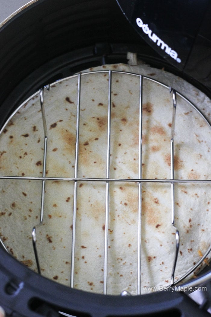quesadilla in the air fryer, with a rack on top