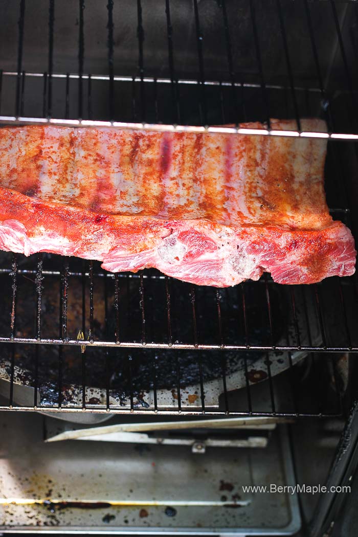 raw beef ribs in the electric smoker