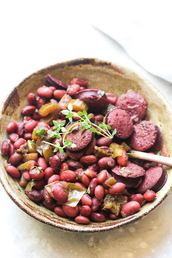 a bowl of pressure cooker smoked sausage ans red beans