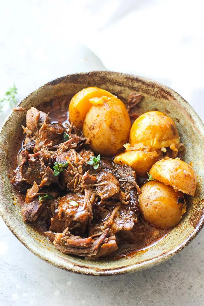 pot roast and potatoes in a bowl