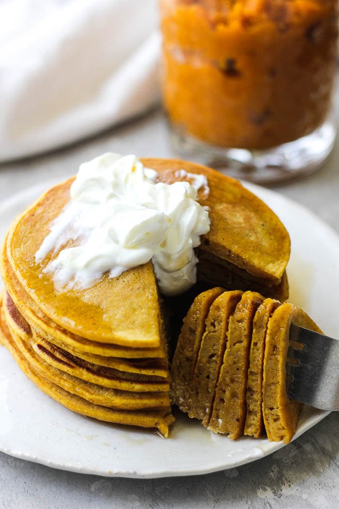 pumpkin pancakes with cream on top
