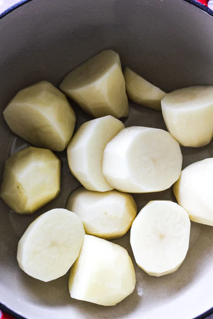 peeled potatoes in the pot