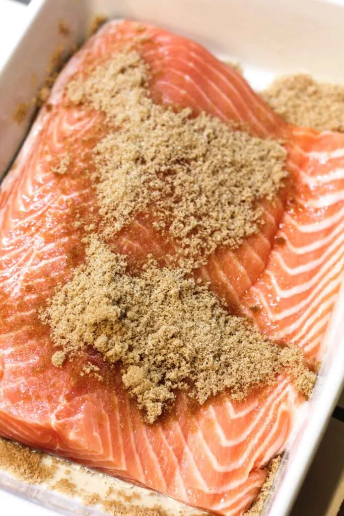 Fresh salmon fillet covered with brown sugar rub