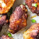 smoked chicken wings with chopped green onions on top
