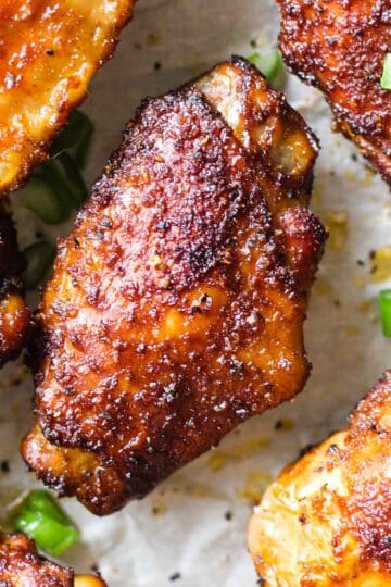 smoked chicken wings with chopped green onions on top