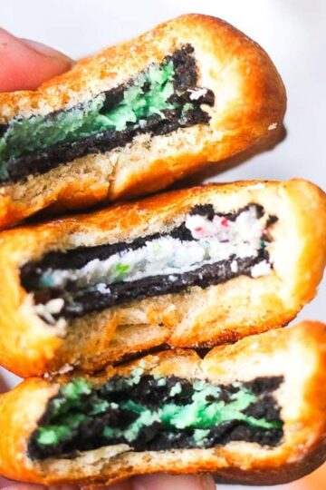 close shot of stack of three fried oreos in dough