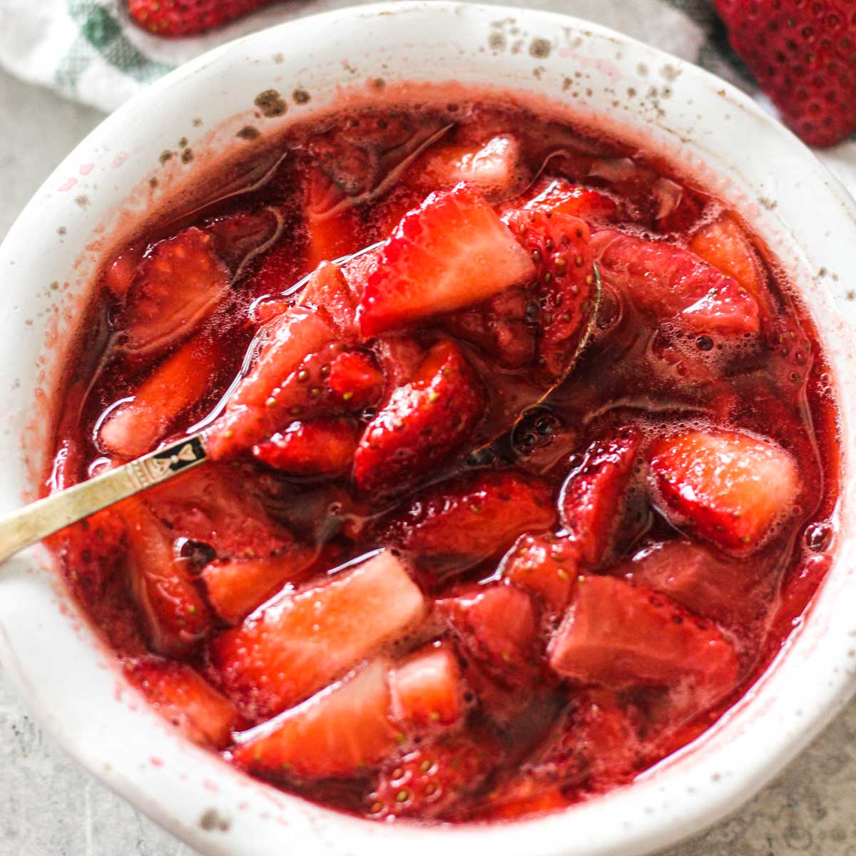 featured square image of cooked chunky strawberry sauce
