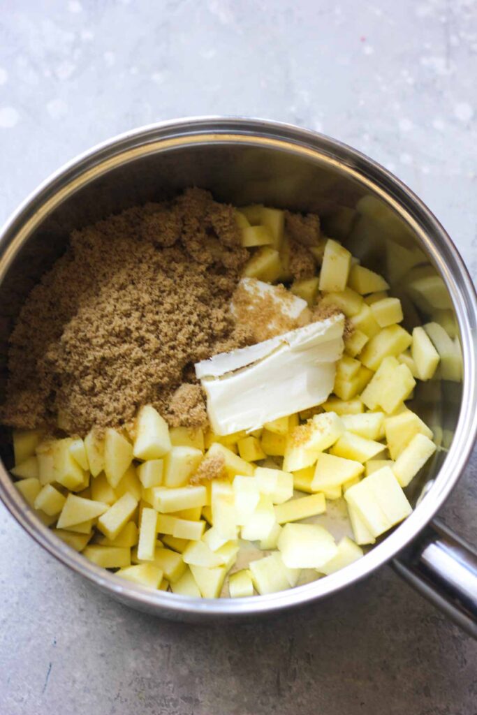 homemade apple pie fillng ingredients in the small pot