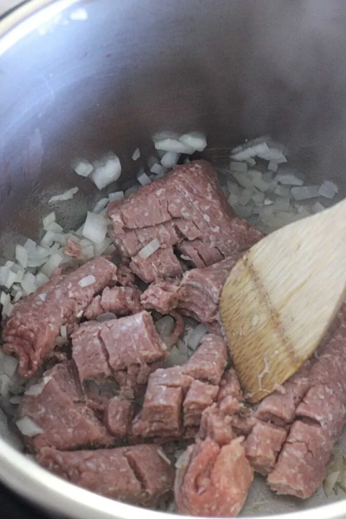 ground beef in pressure cooker pot