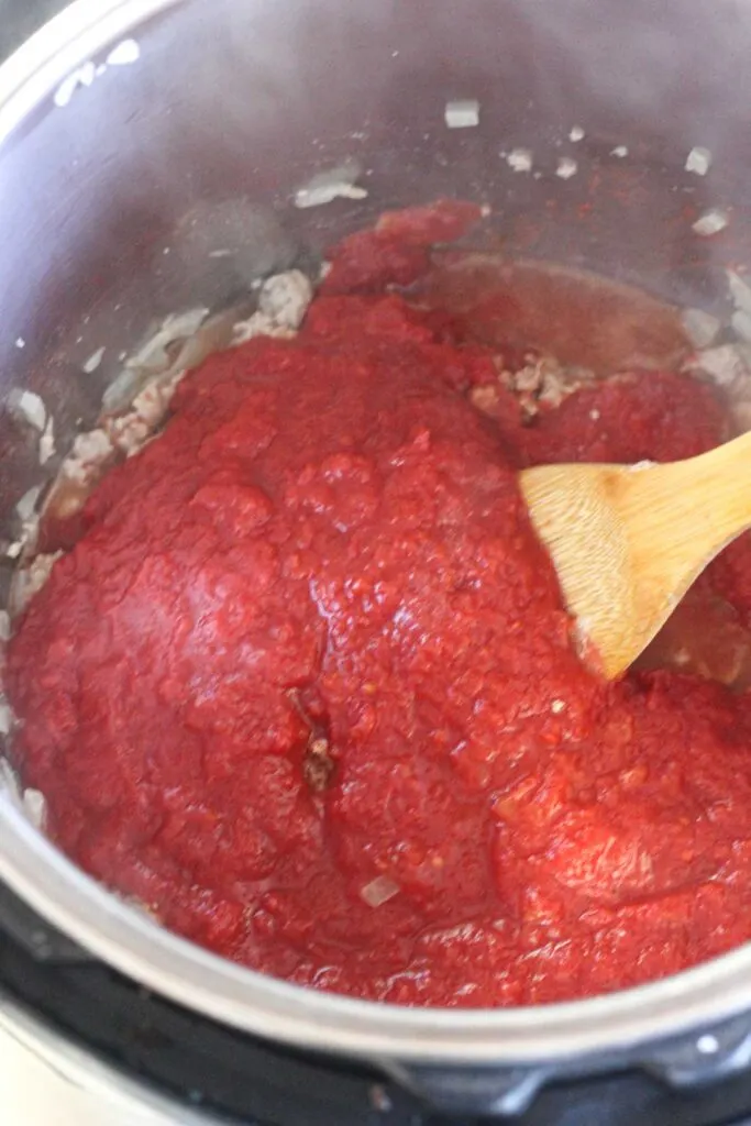 sauteing crushed tomatoes in insntant pot inner pot