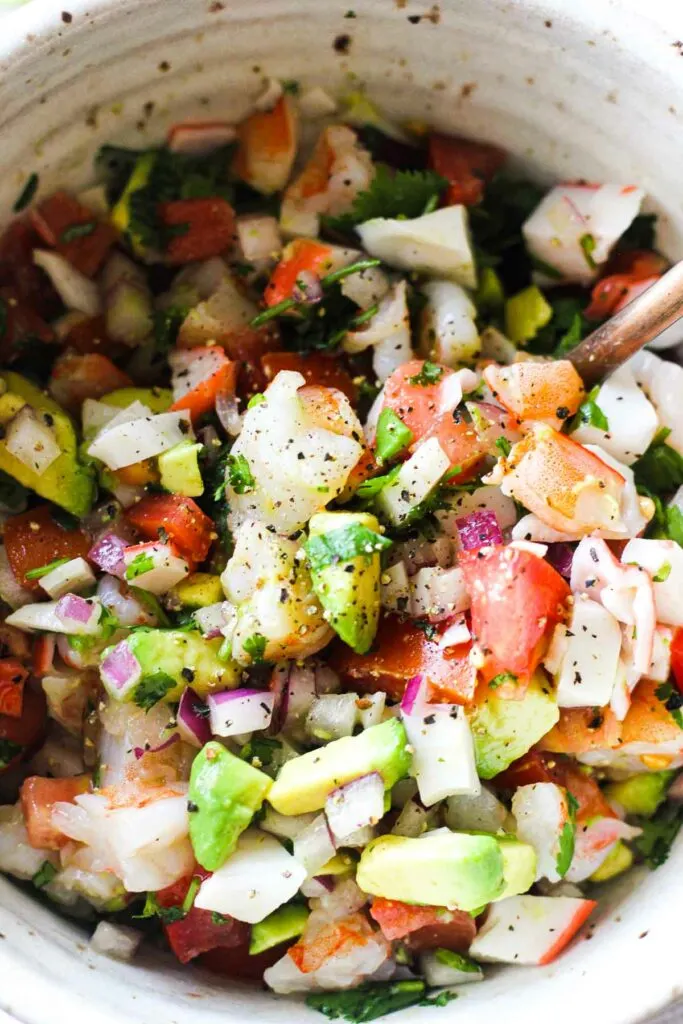 close look at the crab and shrimp salad in the bowl