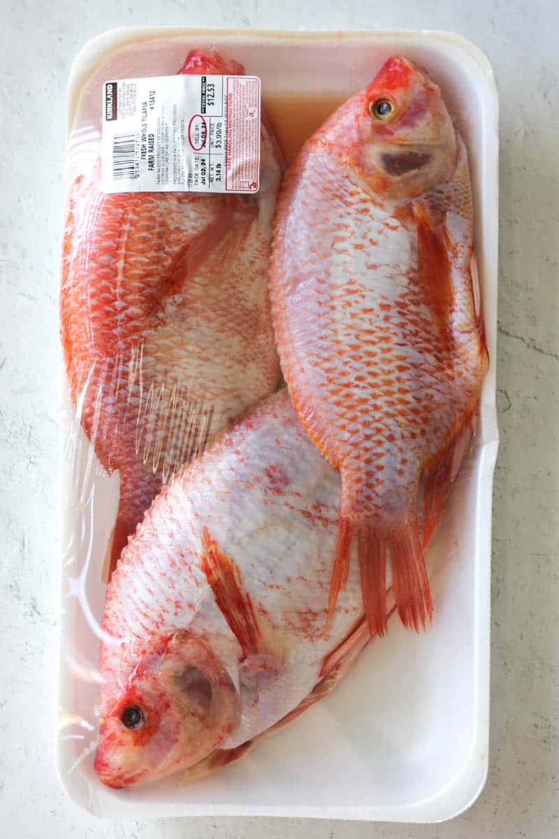 raw whole tilapia in the package