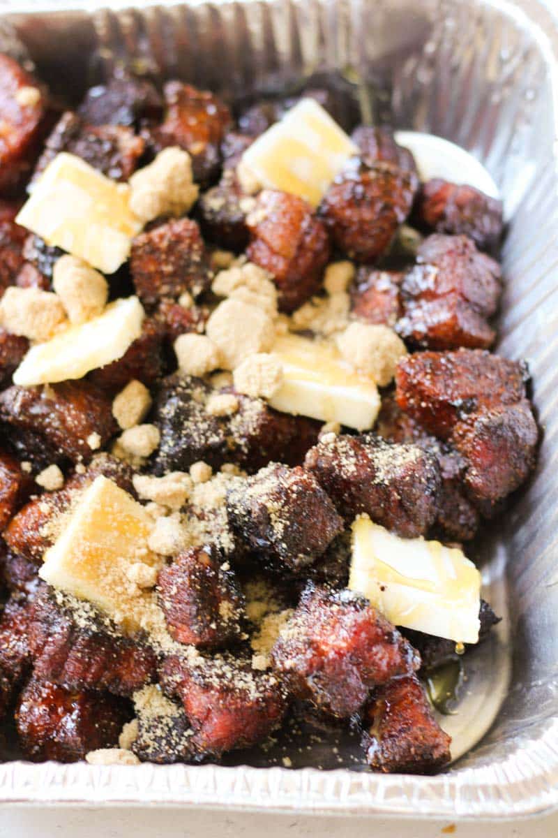 butter and sugar on top of pork pieces