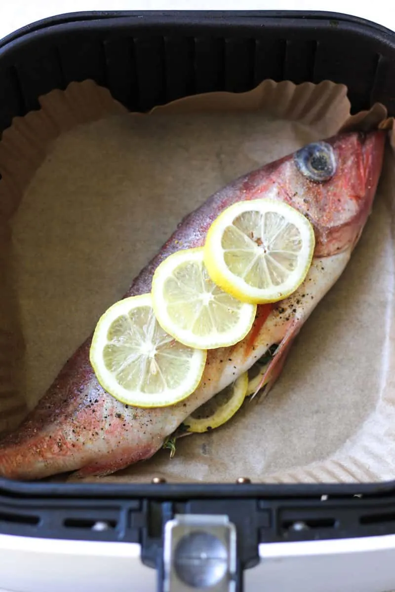 whole red snapper in the air fryer stuffed with lemon and rosemary