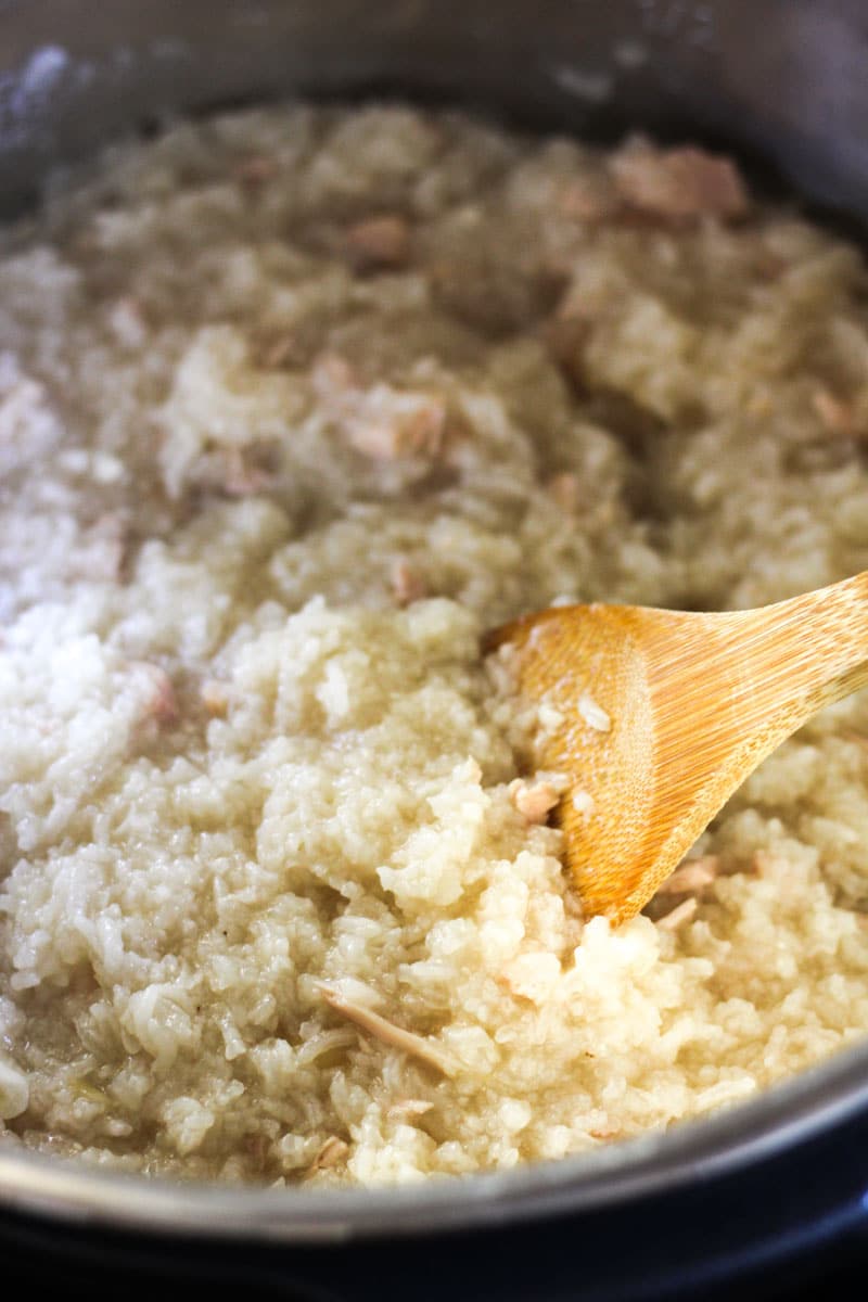 scooping turkey congee in instant pot