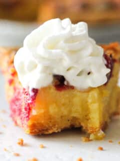 cranberry chess pie slice with whipped cream