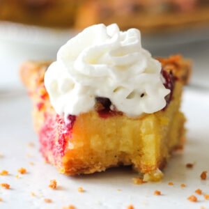 cranberry chess pie slice with whipped cream