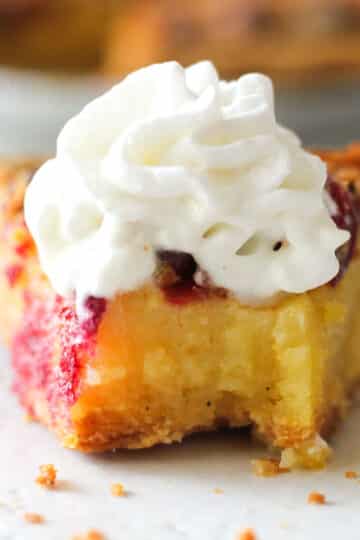 cranberry chess pie slice with whipped cream